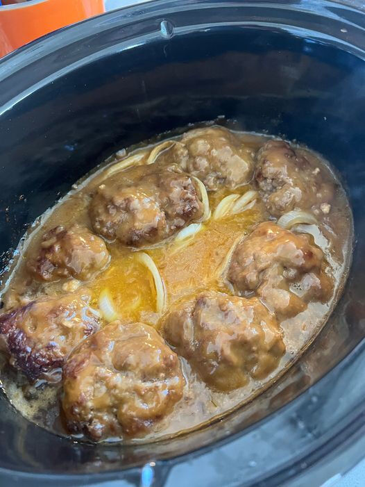 Slow Cooker Salisbury Steak Absolutely! Here’s a full, engaging, and ready-to-publish article for your **Slow Cooker Salisbury Steak** recipe — perfect for a food blog, recipe card, or cozy dinner feature.  —  # **Slow Cooker Salisbury Steak: A Comfort Classic Made Easy**  If you’re craving a hearty, homestyle dinner that practically cooks itself, this **Slow Cooker Salisbury Steak** is exactly what you need. Tender beef patties simmered in a rich, savory onion and mushroom gravy — it’s the ultimate comfort food, made simple thanks to your slow cooker.  This dish transforms humble ingredients into a restaurant-worthy meal, perfect for cozy family dinners, Sunday suppers, or meal prepping for the week ahead. With its melt-in-your-mouth texture and rich flavor, it’s no wonder this recipe has become a timeless classic.  —  ## **Why You’ll Love This Recipe**  * 🍽️ **Pure Comfort:** Juicy, flavorful beef patties in a luscious brown gravy. * ⏱️ **Effortless Cooking:** Your slow cooker does all the work — no standing over the stove. * 🧅 **Family Favorite:** A classic dish that everyone from kids to adults will love. * 🍄 **Budget-Friendly:** Uses simple, affordable ingredients that stretch a meal beautifully.  —  ## **Ingredients**  ### For the Patties:  * 2 lbs ground beef (80/20 recommended for tenderness) * 1 packet dry onion soup mix * ½ cup bread crumbs * ¼ cup milk * 1 large egg * 1 tablespoon Worcestershire sauce * ½ teaspoon black pepper * ½ teaspoon garlic powder  ### For the Gravy:  * 1 can (10.5 oz) cream of mushroom soup * 1 packet brown gravy mix * 1 cup beef broth * 1 tablespoon ketchup * 1 teaspoon Dijon mustard (optional, for tang) * 1 small onion, sliced * 1 cup sliced mushrooms (optional but recommended)  —  ## **Instructions**  1. **Make the Patties:**    In a large mixing bowl, combine ground beef, onion soup mix, bread crumbs, milk, egg, Worcestershire sauce, pepper, and garlic powder. Mix until just combined — don’t overmix or the patties will be dense.    Shape into 6–8 oval patties.  2. **Brown the Patties (Optional but Recommended):**    Heat a skillet over medium-high heat and brown each patty for about 1–2 minutes per side. This step adds extra flavor but can be skipped if you’re short on time.  3. **Prepare the Gravy:**    In a separate bowl, whisk together the cream of mushroom soup, brown gravy mix, beef broth, ketchup, and Dijon mustard until smooth.  4. **Layer in the Slow Cooker:**    Add sliced onions and mushrooms to the bottom of the slow cooker. Place the browned patties on top, then pour the gravy mixture evenly over everything.  5. **Cook Low and Slow:**    Cover and cook on **low for 5–6 hours** or **high for 3–4 hours**, until the patties are tender and fully cooked through.  6. **Serve:**    Spoon the rich gravy over the steaks and serve warm with your favorite side dishes.  —  ## **Serving Suggestions**  Salisbury steak is all about that hearty, comforting pairing! Try serving it with:  * **Mashed potatoes** – the perfect vehicle for all that delicious gravy * **Buttered egg noodles** – another classic combination * **Steamed green beans** or **roasted carrots** – to balance the richness * **Buttery dinner rolls** – to mop up every last bit of sauce  —  ## **Tips for the Perfect Salisbury Steak**  * **Choose the right beef:** 80/20 ground beef gives you juicy, flavorful patties that don’t dry out. * **Add mushrooms for richness:** They enhance the flavor of the gravy beautifully. * **Make ahead:** You can assemble everything the night before and refrigerate the insert — just pop it into the slow cooker the next day. * **Thicken the gravy (optional):** If you prefer a thicker sauce, stir in a cornstarch slurry (1 tablespoon cornstarch + 1 tablespoon water) during the last 30 minutes of cooking.  —  ## **A Homestyle Favorite That Never Fails**  There’s something incredibly comforting about a plate of **Slow Cooker Salisbury Steak** — juicy beef, silky gravy, and that nostalgic flavor that reminds you of home-cooked dinners from childhood.  This slow cooker version gives you all that classic taste without the fuss. Just mix, layer, and let your crockpot work its magic while you go about your day.  The result? A melt-in-your-mouth meal that feels like a warm hug on a plate.  —  Would you like me to format this article for **SEO optimization** (with keywords like “easy Salisbury steak recipe,” “slow cooker beef dinner,” and “comfort food classic”) and add a meta description so it’s ready for publishing on a food blog?
