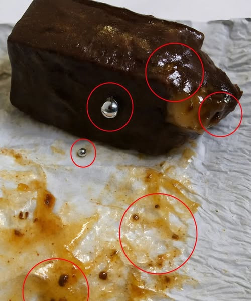 We bought chocolates at the store and found something strange inside: we were surprised when we realized what it was